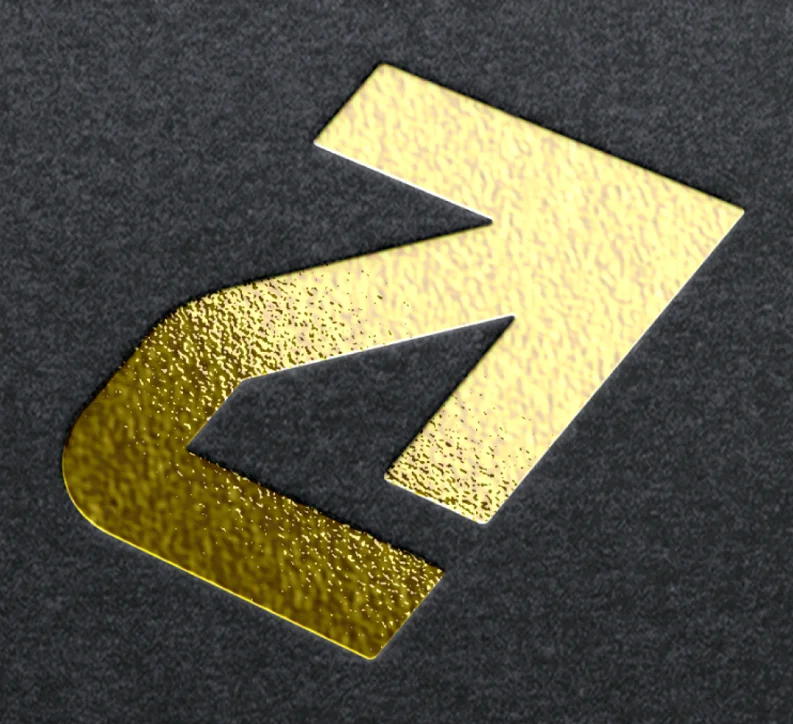 The Alinea mark embossed in gold foil